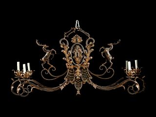 A Wrought Iron and Ta´le Six-Light Chandelier