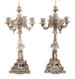 A Pair of Silvered Cast Metal Candelabra Mounted as Lamps