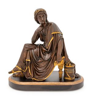 A Continental Gilt and Patinated Bronze Figure