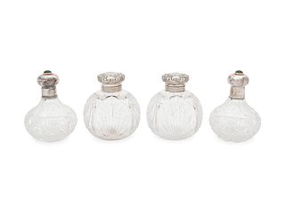 Two Pairs of English Silver Mounted Cut Glass Bottles
