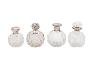 Four English Silver Mounted Cut Glass Bottles
