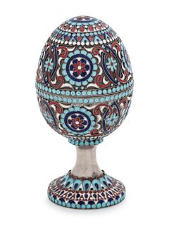 A Russian Silver and Enameled Egg-Form Table Ornament