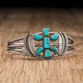 Leekya Deyuse (Zuni,1889-1966) Attributed, Silver and Carved Turquoise Knifewing Cuff Bracelet