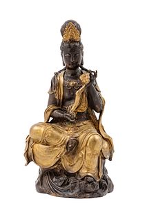 A Chinese Gilt and Patinated Bronze Figure