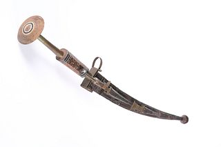 A NORTH AFRICAN TUAREG TAKOUBA SWORD WITH DAGGERS, the octagonal hardwood g