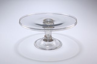 A MID-18TH CENTURY PEDESTAL STEM GLASS TAZZA, the galleried circular dish r