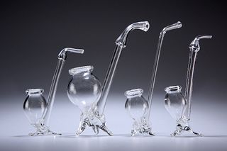 FOUR PORT (OR BRANDY) GLASS PIPES, each with tripod feet. Largest 17.5cm