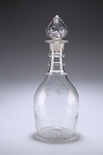 AN IRISH GLASS DECANTER, CIRCA 1785, mallet-shaped with partially fluted bo