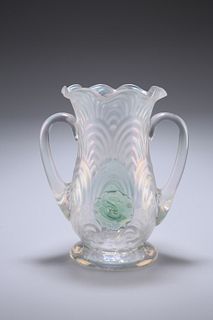 JOHN WALSH WALSH
 AN EARLY 20TH CENTURY GLASS VASE, of footed and compresse