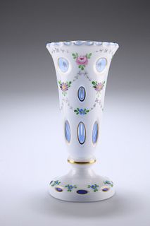 A BOHEMIAN OVERLAY GLASS VASE, LAST QUARTER OF 19TH CENTURY, the white cut-