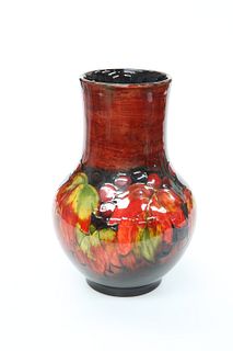 WILLIAM MOORCROFT
 A "LEAF AND BERRY" FLAMBE VASE, CIRCA 1928, painted sign