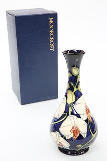 A MOORCROFT POTTERY LIMITED EDITION VASE, BY PHILIP GIBSON, the bottle shap