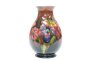 WALTER MOORCROFT
 A FLAMBE "ORCHID" VASE, CIRCA 1940, decorated with flower