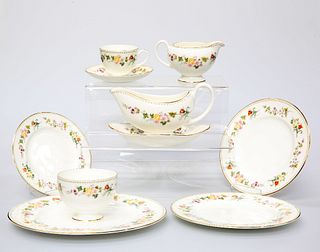 A WEDGWOOD "MIRABELLE" PATTERN DINNER AND TEA SERVICE, comprising eight din