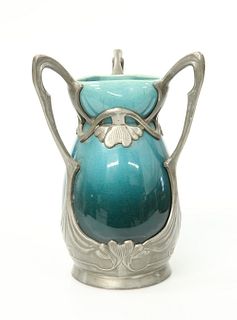 A SECESSIONIST PEWTER-MOUNTED POTTERY VASE, CIRCA 1900, the shaded blue-gla