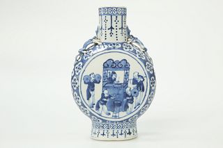 A CHINESE BLUE AND WHITE PORCELAIN MOON FLASK, 19TH CENTURY, of characteris