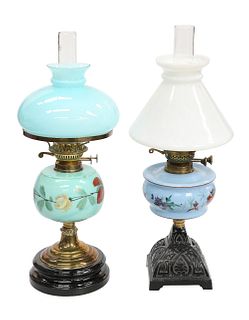 TWO VICTORIAN OIL LAMPS, each with painted glass reservoir, the first with 