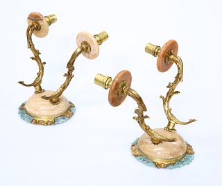 A PAIR OF ORMOLU AND ONYX WALL SCONCES, each with scroll-cast branches.