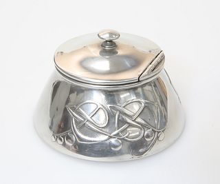 ARCHIBALD KNOX (1864-1933)
 A LIBERTY & CO TUDRIC PEWTER INKWELL, no. 0653,