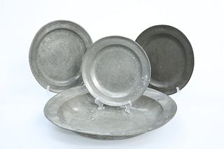 A GROUP OF 18th AND EARLY 19th CENTURY PEWTER, comprising: a large dish, ci