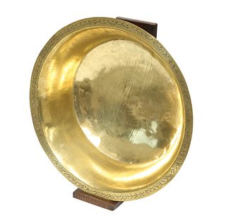 A 19TH CENTURY BRASS CREAM BOWL ON STAND, the rim decorated with concentric