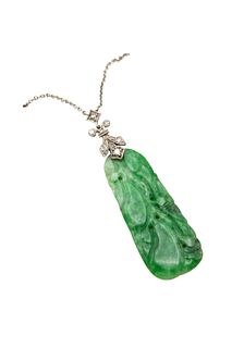 A JADEITE AND DIAMOND PENDANT NECKLACE 
 The carved jadeite plaque, to a di