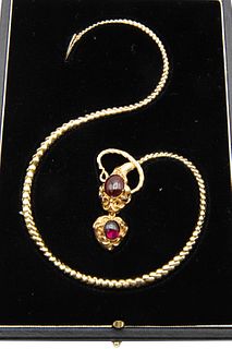 A GARNET-SET SNAKE NECKLACE, CIRCA 1850
 Of stylised serpent design, the ta