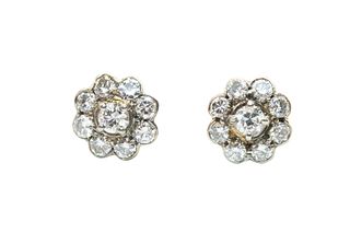 A PAIR OF DIAMOND CLUSTER EARRINGS 
 Each floral cluster set throughout wit