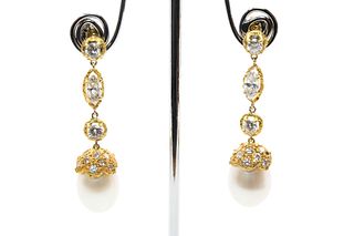 A PAIR OF CULTURED PEARL AND DIAMOND DROP EARRINGS
 Each articulated drop, 