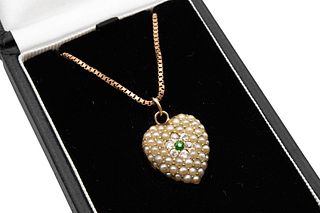 A LATE 19TH CENTURY SEED PEARL, GREEN GARNET AND DIAMOND PENDANT
 Of heart-