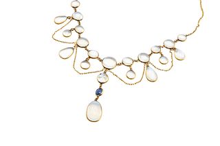 A MOONSTONE AND SAPPHIRE NECKLACE
 Of multi-row swagged design, set through