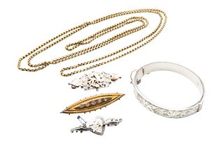 A collection of gold and silver jewellery, to include a hinged engraved ban