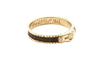 A HAIRWORK MOURNING RING, CIRCA 1862
 Designed as a pair of clasped hands, 