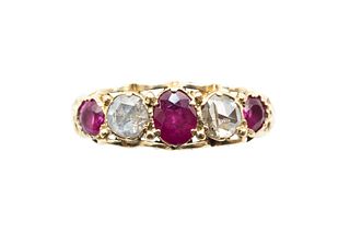 A RUBY AND DIAMOND FIVE-STONE RING
 The oval and circular-cut rubies, inter