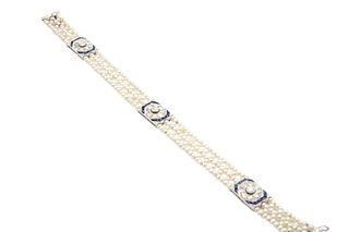 A PEARL, SAPPHIRE AND DIAMOND BRACELET
 The multi-row pearl bracelet, punct