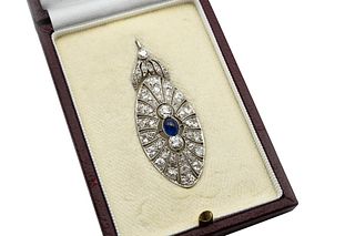 A SAPPHIRE AND DIAMOND PENDANT
 The openwork navette-shaped pendant, centre