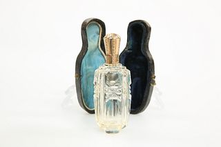 A 19th CENTURY GOLD-MOUNTED CUT-GLASS SCENT BOTTLE, PROBABLY FRENCH, the ta