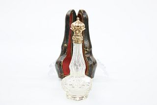 A 19th CENTURY GOLD-MOUNTED CUT-GLASS SCENT BOTTLE, POSSIBLY FRENCH, the ye