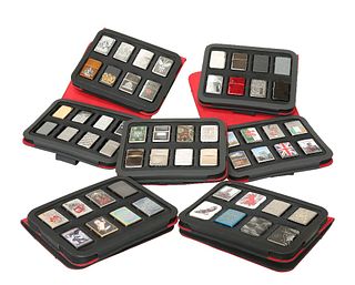 A LARGE COLLECTION OF ZIPPO LIGHTERS, approximately 155 in Zippo cases.