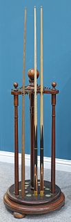 A 19TH CENTURY REVOLVING CUE RACK, for fifteen cues, unmarked but probably 