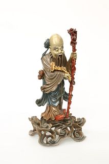 A CHINESE PARCEL-GILT AND POLYCHROME PAINTED CARVED WOODEN FIGURE OF AN IMM