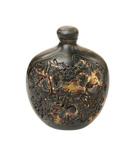 A CHINESE TORTOISESHELL SNUFF BOTTLE, 19TH CENTURY, carved and pierced to t
