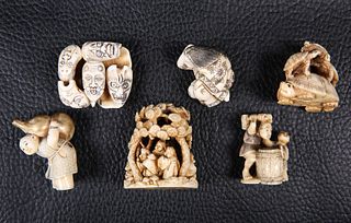 SIX JAPANESE IVORY NETSUKES, MEIJI PERIOD, including a group of noh masks, 