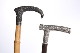 TWO CHINESE WHITE-METAL HANDLED WALKING STICKS, LATE 19TH CENTURY,?one with