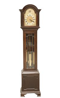AN EARLY 20TH CENTURY OAK WESTMINSTER CHIME LONGCASE CLOCK, the arched hood