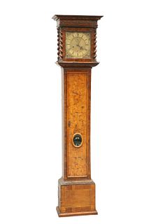 A WALNUT EIGHT-DAY LONGCASE CLOCK, the hood with fretwork and spiral column