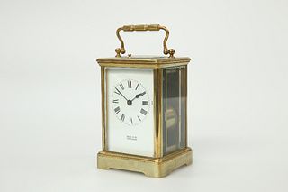 A FRENCH BRASS CASED CARRIAGE CLOCK WITH PUSH BUTTON REPEAT, signed Martin 