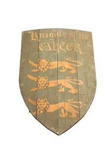 A PAINTED ARMORIAL SHIELD, inscribed Knights of the Garter. 88cm high, 56cm