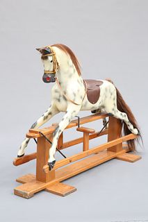 HADDON ROCKERS
 A CARVED AND PAINTED ROCKING HORSE, dapple grey with horseh