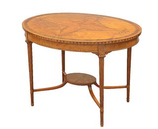 AN INLAID SATINWOOD CENTRE TABLE, CIRCA 1890,?the quarter-veneered oval top